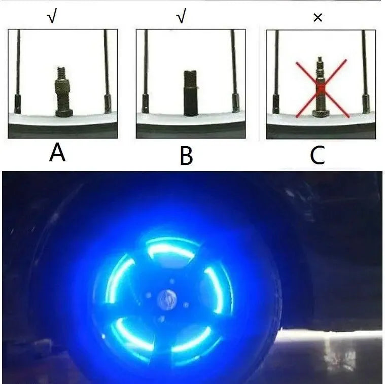 Žalios LED ventilio galvutės dviračiui, 2 vnt., matomos kaip šviečia ir papuošia ratlankį.
