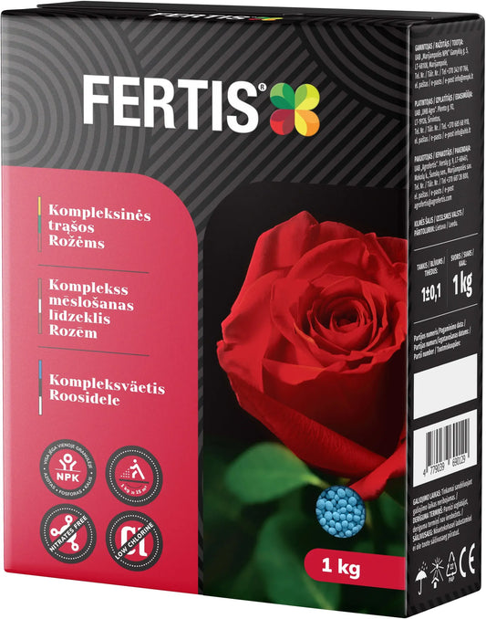 Kompleksinės trąšos rožėms FERTIS, 1kg, smulkios trąšų granulės ant augalų ir dirvos, rožių krūmas.