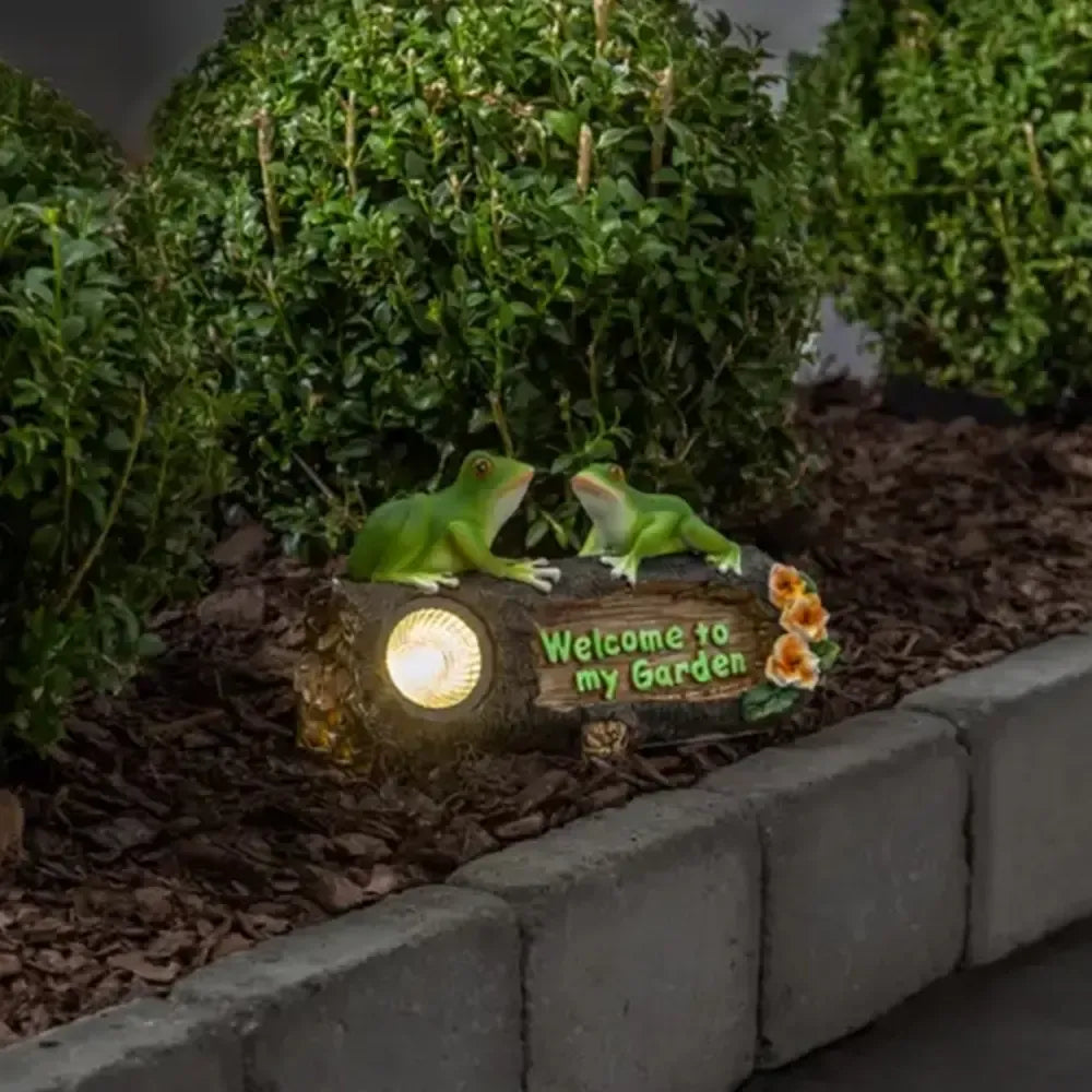 Lauko LED lempa „Frogy“ su saulės baterija, 24x14 cm, dekoratyvinis apšvietimas sodui ir terasai.