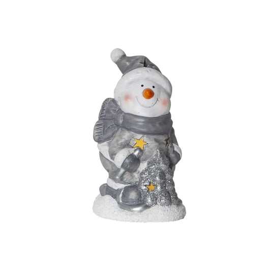 LED dekoracija „Besmegenis su eglute“, 15x9 cm, šviečianti balta sniego figūra su mažu žaliuoju eglutės elementu.