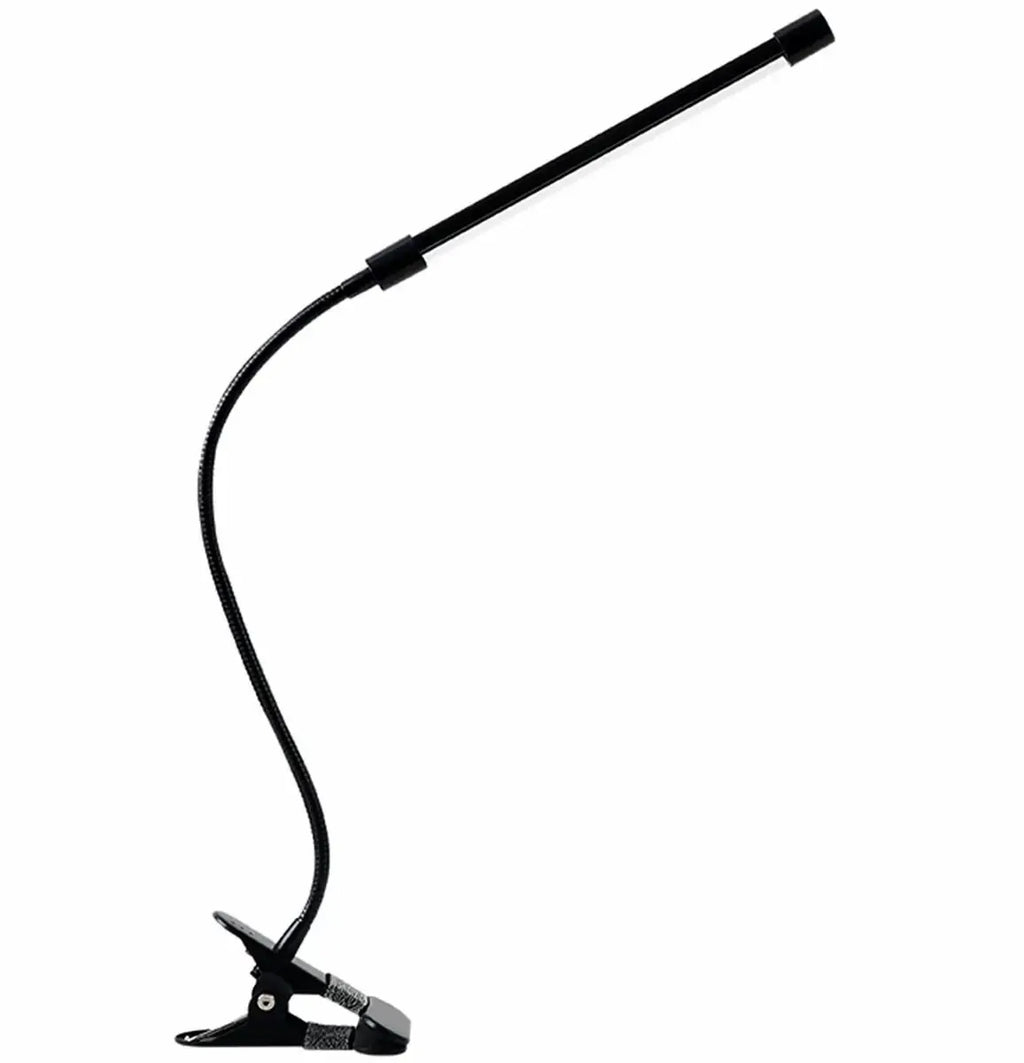 LED lempa su segtuku ant balto paviršiaus, lankstus kaklelis ir reguliuojamas apšvietimas