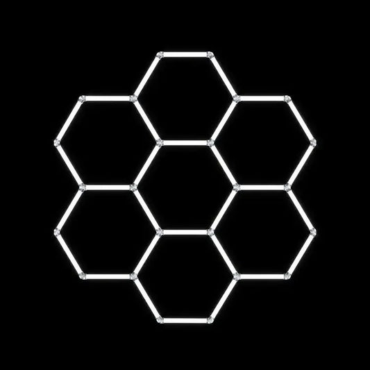 Modulinis lubinis LED šviestuvas Hexagon su geometriniu dizainu, baltos spalvos, modernus apšvietimo sprendimas.