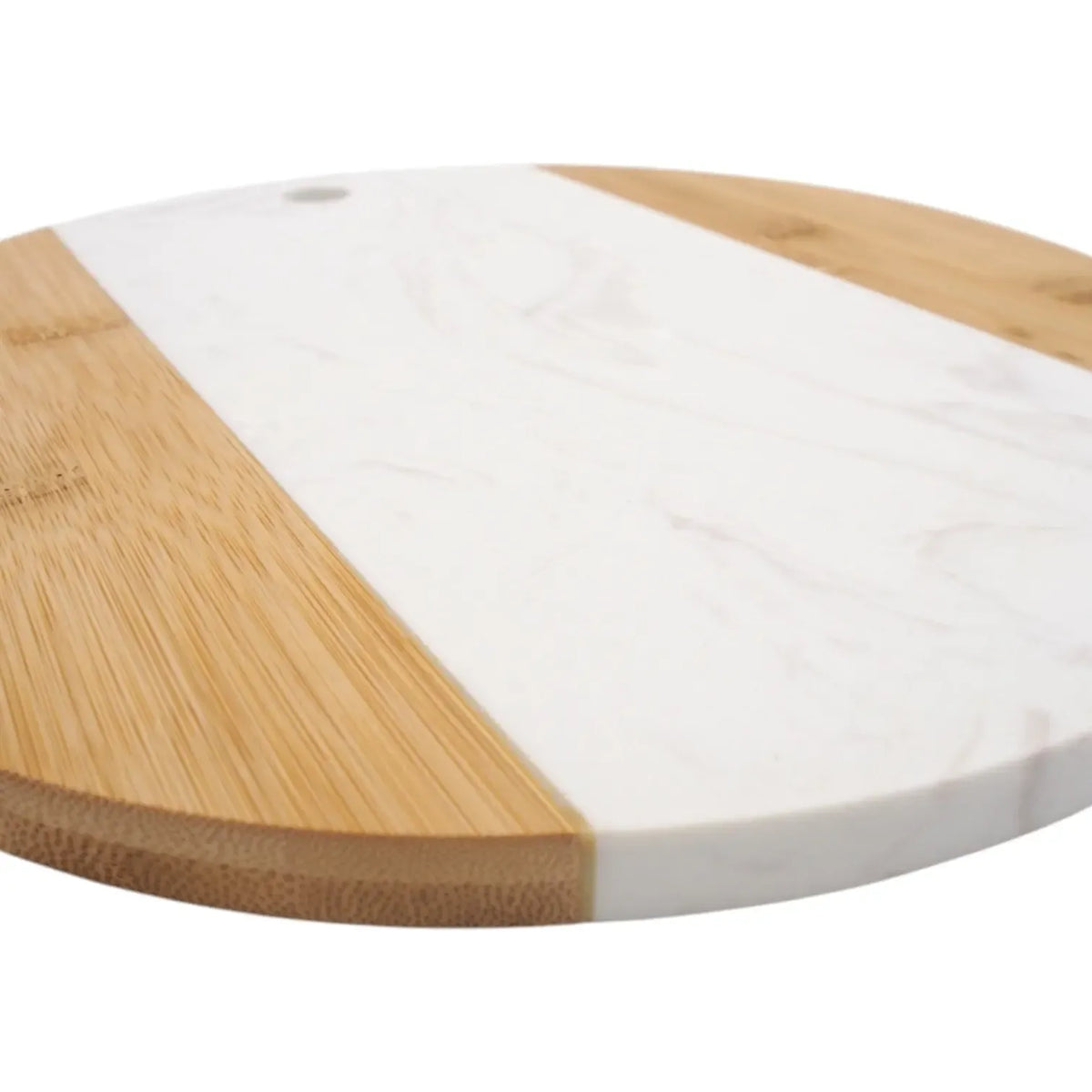 Apvali marmurinė pjaustymo ir serviravimo lentelė, 30 cm skersmens, su marmuro raštais ir elegantiška išvaizda.