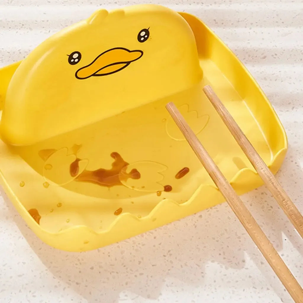 Plastikinis universalus virtuvės įrankių laikiklis Duck, tinkamas saugiai laikyti virtuvės įrankius ir šaukštus.