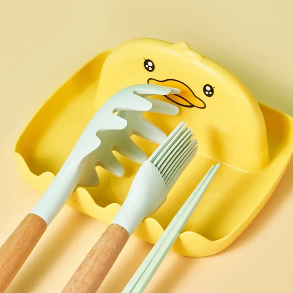 Plastikinis universalus virtuvės įrankių laikiklis Duck, baltas, su keliomis vietomis šaukštams ir peiliams laikyti.