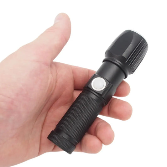 Įkraunamas LED prožektorius Power Style TR2004B su USB ir apsauginiu dėklu, ryškus ir patvarus šviesos šaltinis.