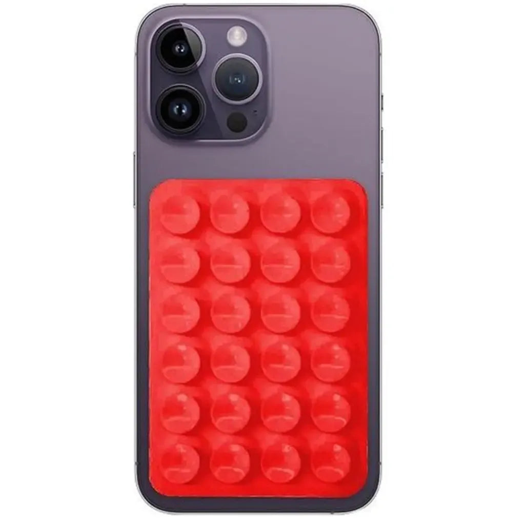 Raudonas silikoninis telefono laikiklis su vakuuminiais siurbtukais, patogiai laikyti ir pritvirtinti prie paviršių.