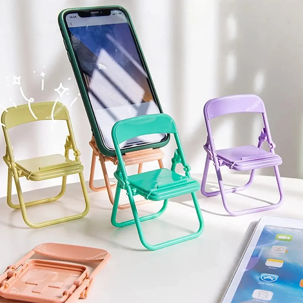 Telefono stovelis „Kėdė“ – patogus ir stilingas laikiklis iš plastiko, skirtas stabiliai laikyti telefoną ant stalo.