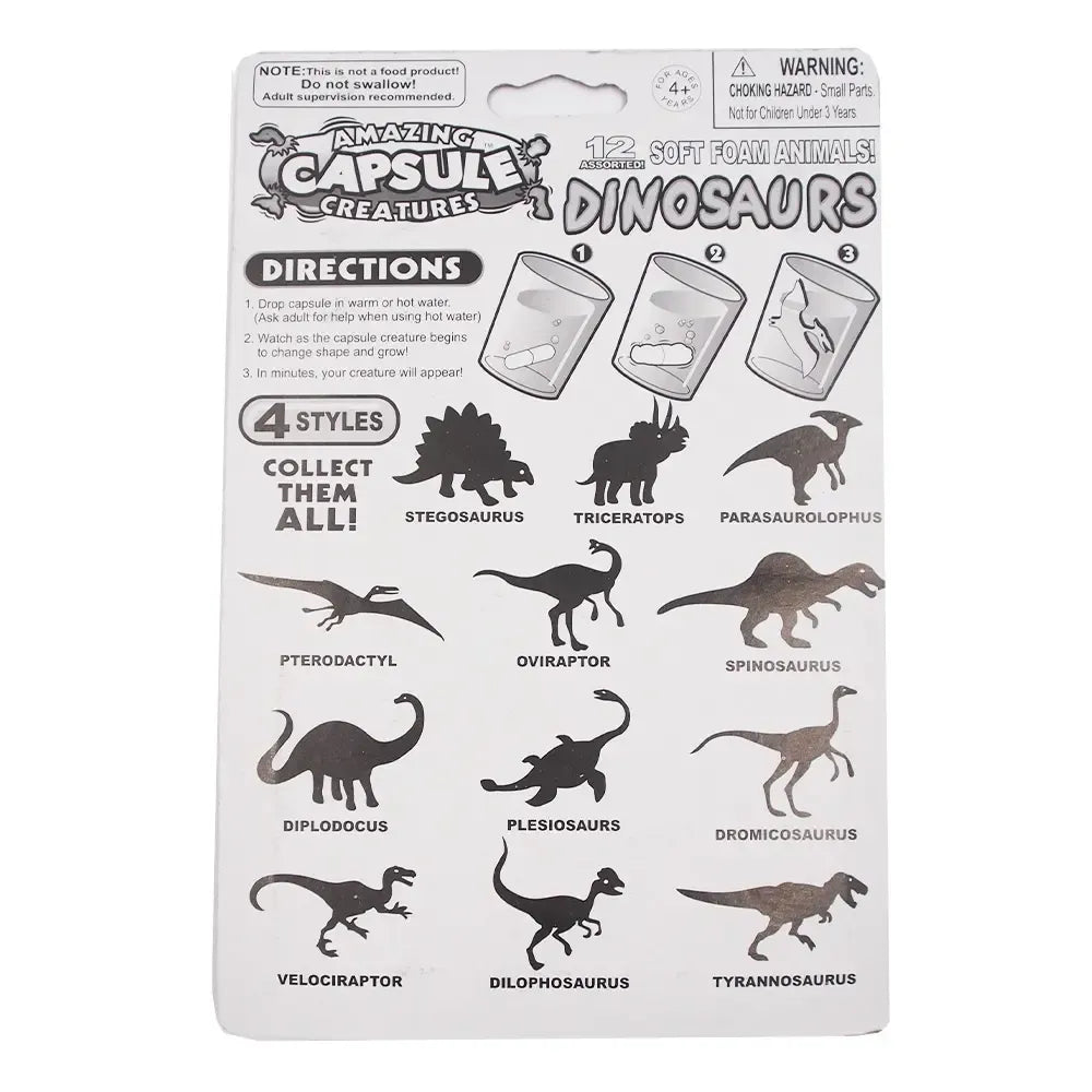 Vandenyje augančios kapsulės Dinosaurs, matomos iš arti, su žaliomis ir mėlynomis kapsulių detalėmis.